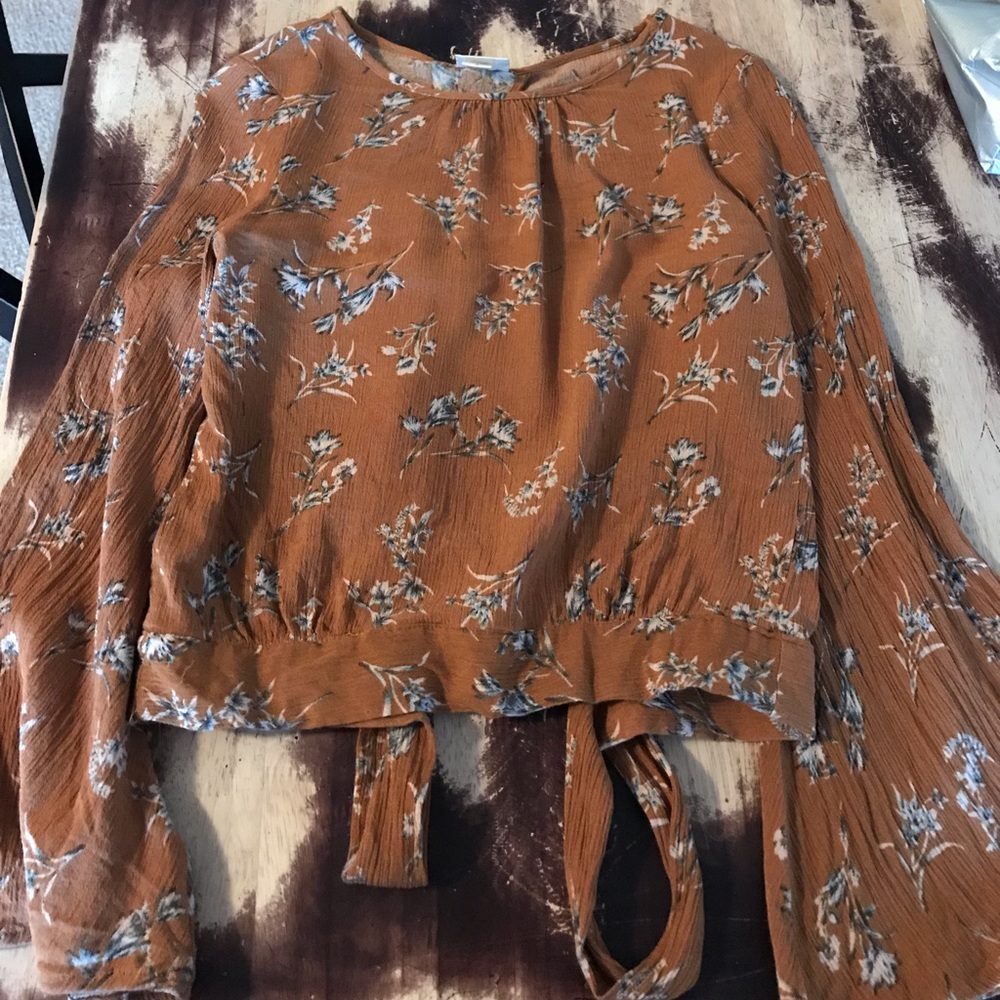 opened back blouse